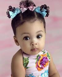 When do we shave off their first hair? At what age do we?