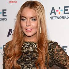 Lindsay Lohan parties past midnight one day after being treated for  'exhaustion and dehydration'