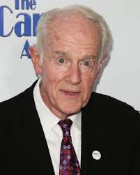 Captain greets Major Burns with a salute