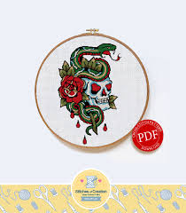 12.71 x 9.43 inches or 32.29 x 23.95 cm letters are 14 stitches tall, 1 inch or (2,54 cm) on 14 aida. Skull Snake Tattoo Digital Download By Stitches Of Creation On