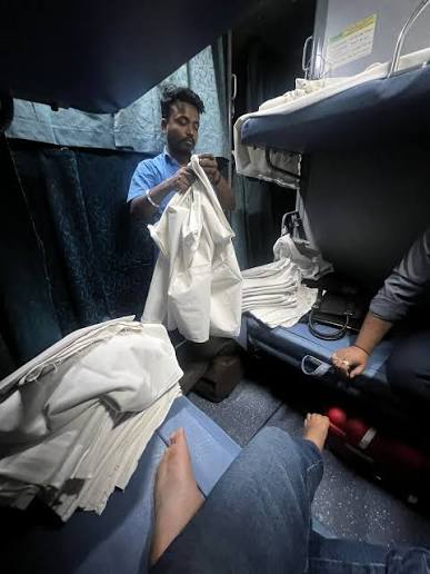Who is responsible for unclean bed sheets on Indian Railways?