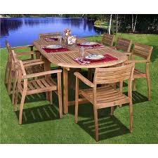 Teak patio tables and chairs on brick deck. Renaldo 9 Piece Teak Wood Outdoor Table And Chairs Set X5278 Lamps Plus