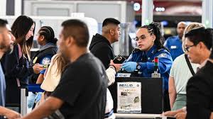 TSA lines stretch for hours as shutdown hits spring break travel