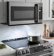 The otr also takes up most of the space above your stove so it's hard to have a special tile feature right above your range. Cafe 2 1 Cu Ft Over The Range Microwave Oven Cvm521p2ms1 Cafe Appliances