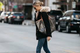 blonde woman wearing zara faux fur trimmed black parka goyard tote fashion jackson dallas blogger fashion blogger street fashion jackson fashion winter fashion