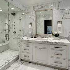 Surrounded by carrera marble and stunning city views, the powder. Master Bathroom With Carrera Marble Carrera Marble Bathroom White Marble Bathrooms Marble Bathroom