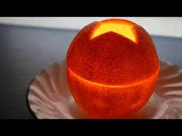Olive Oil And Orange Peel How To Make An Amazing Orange Candle Health Awareness Community Orange Candle Orange Peel Candle Candle Decor