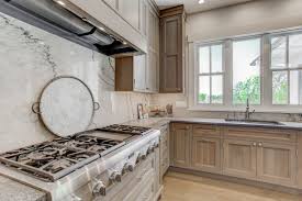 Besides adding beautiful furniture and decorative pieces, howard designed an inspiring kitchen with beached quarter sawn white oak cabinets. Calming Quarter Sawn Crystal Cabinets