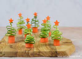 Whether it's classic deviled eggs or shrimp cocktail, find some great ideas that range from appetizing plates to elegant hors d'oeuvres. Easy Cucumber Christmas Trees Healthy Christmas Party Food For Kids Eats Amazing