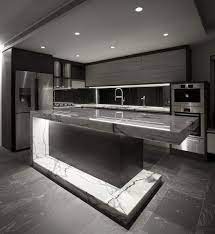 Sleek look, black and white kitchen, white modular kitchen with a blacksplash. Modern Luxury Interior Design Ideas Kitchen Designs