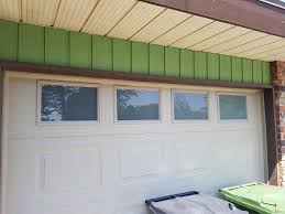 Window inserts for the garage door don't just enhance as well as give it an elegant appearance, they additionally enable sunlight to get into the garage reducing the expense of brightening up the garage. Window Inserts Installed Insulated Steel Garage Door Access Garage Doors
