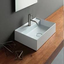 Black quartz is a unique countertop that has stunning designs with black handles and a dark wood floor. Countertop Washbasin 31100101 Alice Ceramica Rectangular Ceramic Contemporary