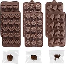 Small silicone baking molds are also easier to find, less expensive, and the most versatile (more on that below) sorts available. Amazon Com Warmhut 6 Pack Silicone Chocolate Molds Heart Flower Shape Chocolate Candy Mold 15 Cavity Chocolate Mold Kitchenware For Parties Wedding Festival Come With 100pcs Wrapping Bags Kitchen Dining