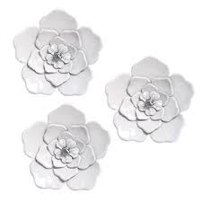 Add floral flair to your home with this white metal flower decor. Stratton Home Decor White Metal Wall Flowers Set Of 3