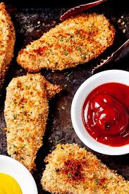 Using the batter in this order allows for the chicken to come out crispy on the outside and tender on the inside. Crispy Baked Chicken Tenders Panko Chew Out Loud