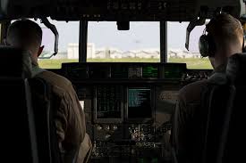 Capt. Charles Casey, left, an aircraft commander with