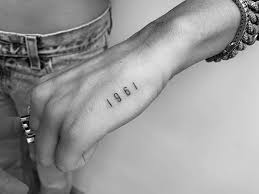 She got her first tattoo in 2009 when she was 17. Miley Cyrus Debuts New Breakup Tattoo At Mtv Vmas