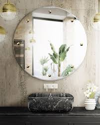 By keeping the walls and the vanity simple and neutral, the designer is able to experiment with the shower and floor tiles and create a load of visual interest with this starburst pattern. 5 Unique Mirrors To Glam Up Your Bathroom Design Maison Valentina Blog