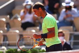 Rafael nadal of spain returns a shot in the men's doubles gold medal match against horia tecau rafael nadal and marc lopez of spain in action during a men's doubles quarterfinals match. A16l9mojt5yvlm