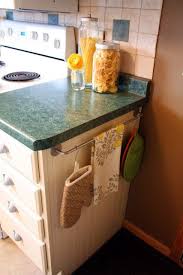 Add A Towel Rod To The End Of A Cabinet To Hang Potholders And Dish Towels Kitchen Organization Kitchen Kitchen Inspirations
