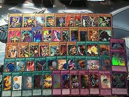 Joey earlier wasn't that good in dueling so he used a mediocre deck but with yugi he learnt many tricks and came to know about many new cards & hence modified his deck to fight against others. Yugioh Battle City Joey Wheeler Deck Time Wizard Red Eyes B Hermos Panther Ebay