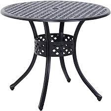 Large round table and 4 chairs provide enough space for your the umbrella hole is designed for outdoor use in hot or rainy weather. Amazon Com Outsunny 33 Round Cast Aluminium Outdoor Patio Dining Table With Umbrella Hole Black Patio Lawn Garden