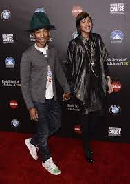 In 2013, he featured in robin thicke's blurred lines and sang the lead soundtrack of despicable me 2, happy. Pharrell Williams Wife Helen Lasichanh And Son Rocket Man Williams Photos Pharrell Pharrell Williams Pharrell Williams Wife