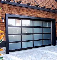 Clean Lines Aluminum Frame And Translucent Glass Panels Make A Modern Classic Garage Door From Nort Garage Door Design Garage Doors Residential Garage Doors