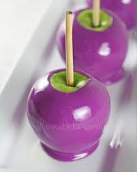 Insert the apple into the chocolate. How To Make Purple Candy Apples Rose Bakes Pink Candy Apples Purple Candy Apples Candy Apples