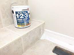 How I Painted And Stenciled My Old Outdated Tile Floor Painted Bathroom Floors Painting Ceramic Tile Floor Tile Floor