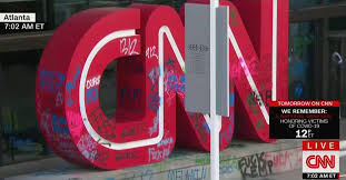 The origin story, as told by toni dwyer in an article by cody sigel combs Cnn Broadcasts Giant Cnn Logo Covered In Profane Graffiti