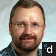 Dr. Michael J. Tomkins, MD