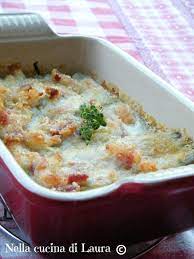 Unite le bietole al sugo di pomodoro e versate il tutto nella teglia. Coste Di Bietola Gratinate Con Mozzarella E Pancetta