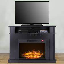Many electric fireplaces fit up against a wall, but you can also choose a corner electric fireplace to create a different aesthetic. 10 Great Tv Consoles With Built In Electric Fireplaces