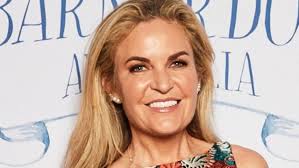 Nadia Bartel hits Noosa beach in skimpy red bikini