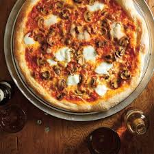 Pizza Toute Garnie Facon Ricardo Ricardo Delicious Pizza Recipes Pizza Recipe Mozzarella Recipes