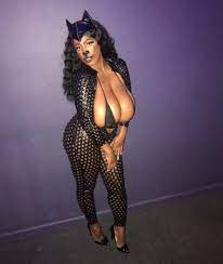 See how this lady dressed for Halloween with her jaw-dropping boobs on  display (Photo)