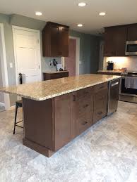 Waypoint 420s Maple Truffle Cabinets With Giallo Ornamental Granite Countertops Mannington Adura Vinyl Flooring Granite Countertops Countertops White Kitchen