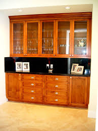 Create a unique focal point in your amish living room or den with your choice of amish entertainment centers. Wall Units Interior Design Services Florida Interior Designers