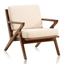 It stands on tapered wooden legs and has deep foam filling. Crate Barrel Decor Look Alikes