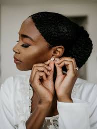 A thick braid from extensions that runs all the way along your hairline and wraps cozily at the nape of your neck is a neat and beautiful style you'll love to wear for a while. 17 Natural Wedding Hairstyles Down Updos Buns More