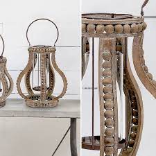 This wooden metal lanterns set is one member of the farmhouse collection. Large Wooden Bead Lantern Wooden Lantern Decor Wooden Lanterns Lanterns Decor