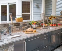 outdoor kitchen cabinets: built in or