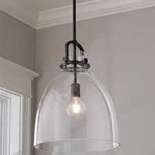 This pendant light will bring some transitional style above your kitchen island, dining table, or entryway. Glass Jug Pendant Large Shades Of Light