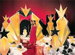 Decorate your table with a bag of silver and black confetti, with lights, cameras, movie reels and star designs. Homecoming Theme Ideas For An Awesome Dance Stumps Spirit Ideas