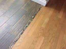 Transitioning Hardwood Floor To Tile Floor Is There A Better Way Flooring Hardwood Floors Transition Flooring