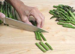 Line up the tip of that stalk with the tips of the remaining stalks. All About Asparagus How To Cooking Tips Recipetips Com
