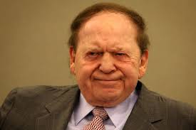 Flare-ups mark Adelson's second day