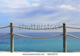 Banister Railing On Marine Rope And Wood Moraira Mediterranean Sea By Holbox Via Shutterstock Rope Fence Deck Railings Deck Railing Pictures