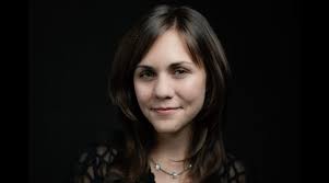 Amanda Held Opelt has a story to write as well